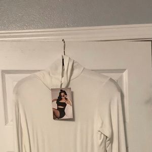 Brand new naked wardrobe
X-Large cream dress.